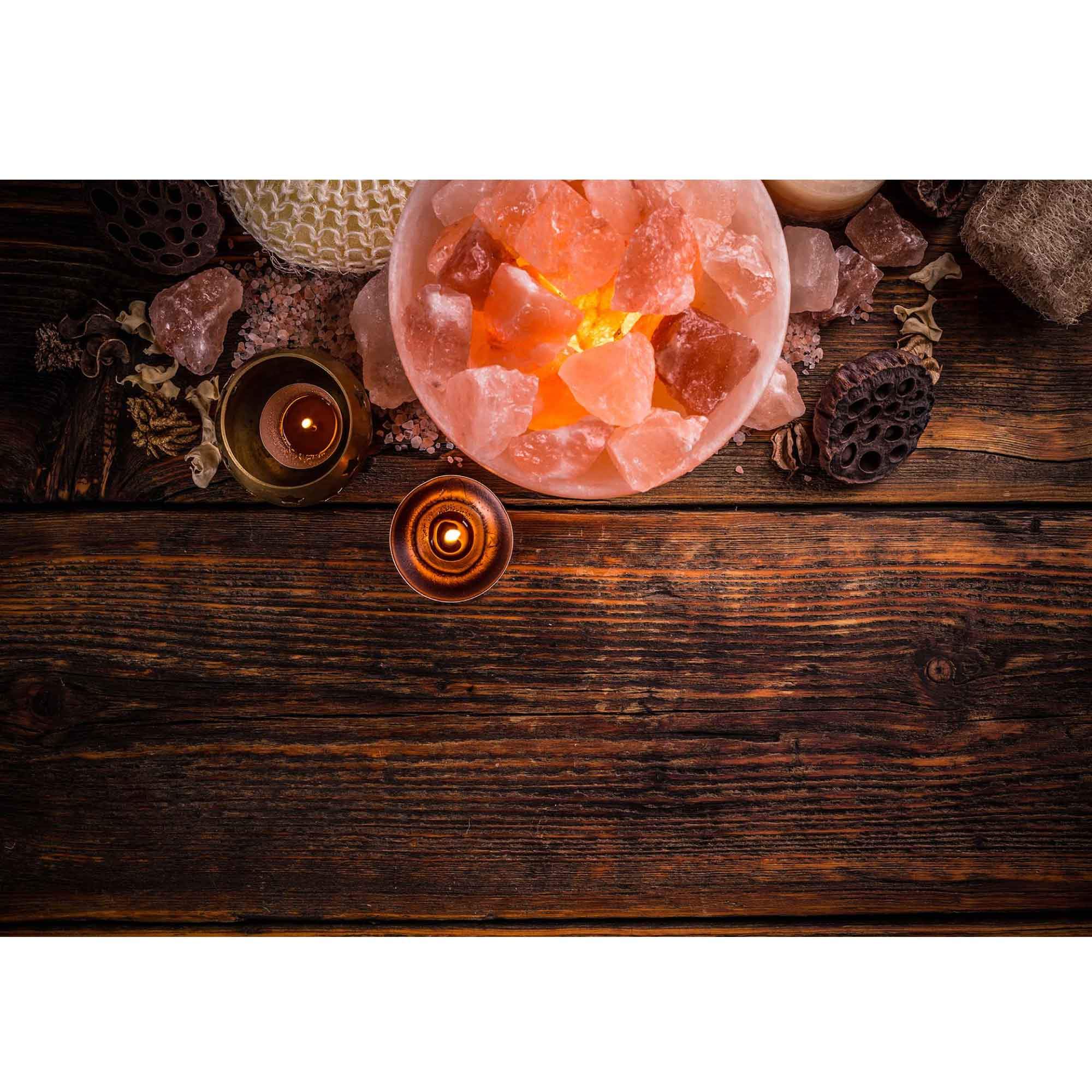 A beautifully carved Fire Bowl Himalayan Pink Salt Lamp, showcasing its natural pink hues and unique rock formations, illuminated with a warm glow.