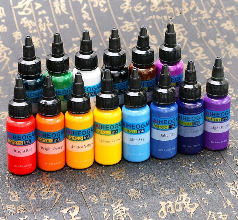 14 Bottle 1oz Tattoo Ink Set featuring vibrant black pigments for professional body art and tattooing.