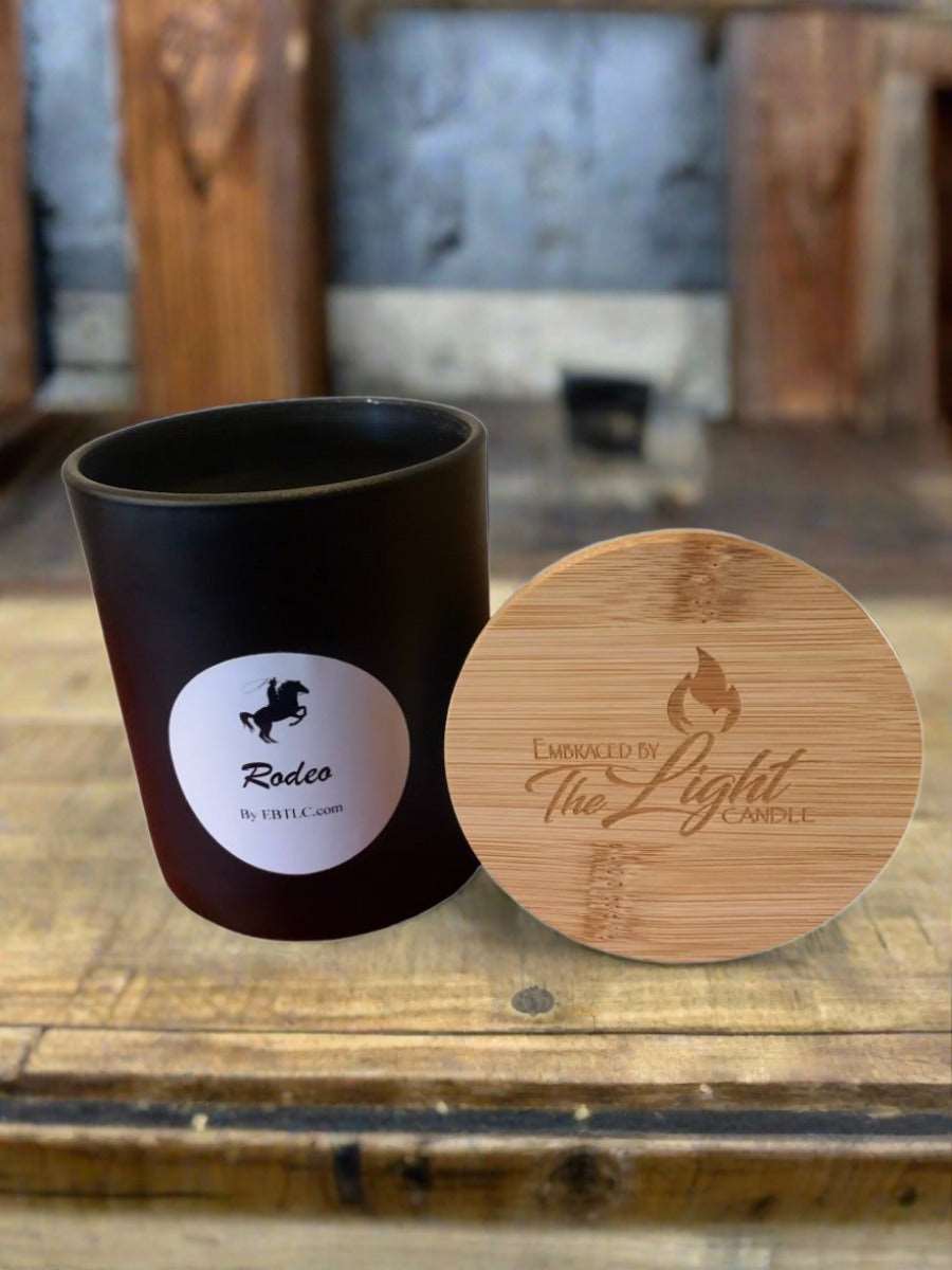 14 oz Rodeo Fragrance Soy Blend Candle with a rustic western design, showcasing its natural soy wax and inviting scent.