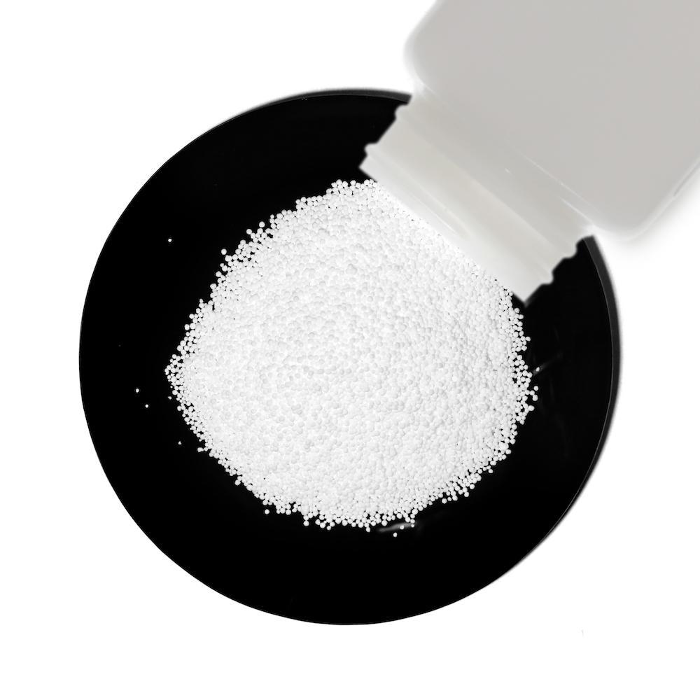 1Kg resealable bag of Sodium Percarbonate, a white powder used for cleaning and sanitising, displayed on a clean surface.