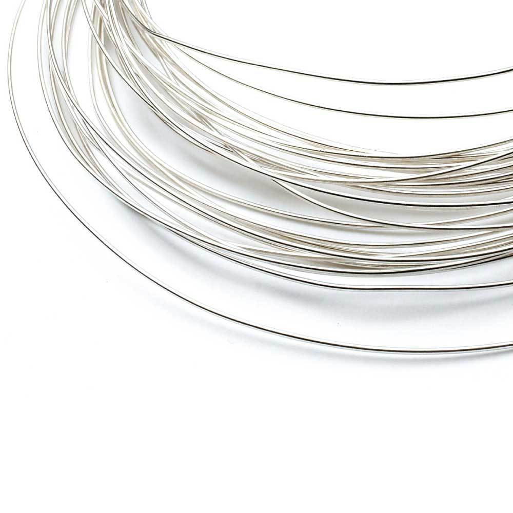 1m roll of 0.4mm soft round sterling silver wire for jewellery making, showcasing its shiny surface and flexibility.