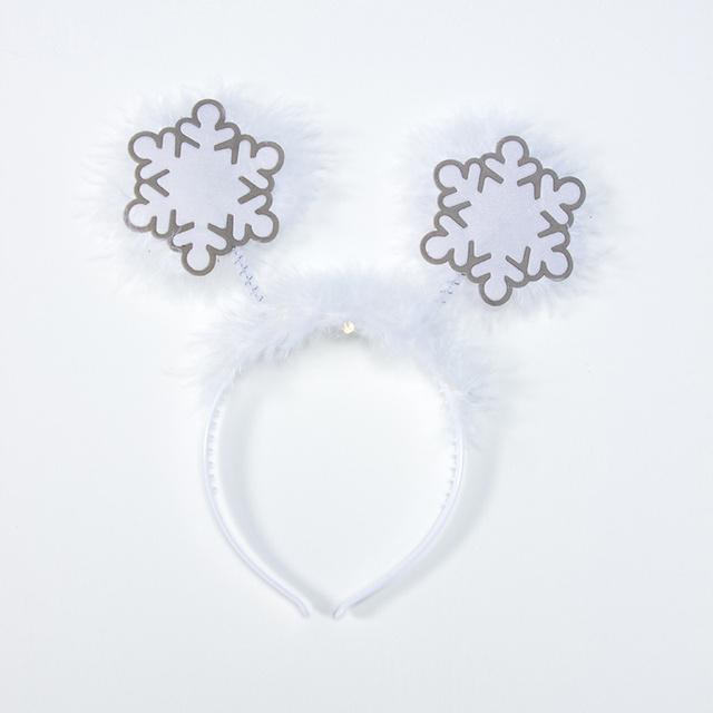 Merry Christmas headband featuring festive antlers and snowflake decorations, perfect for holiday celebrations.