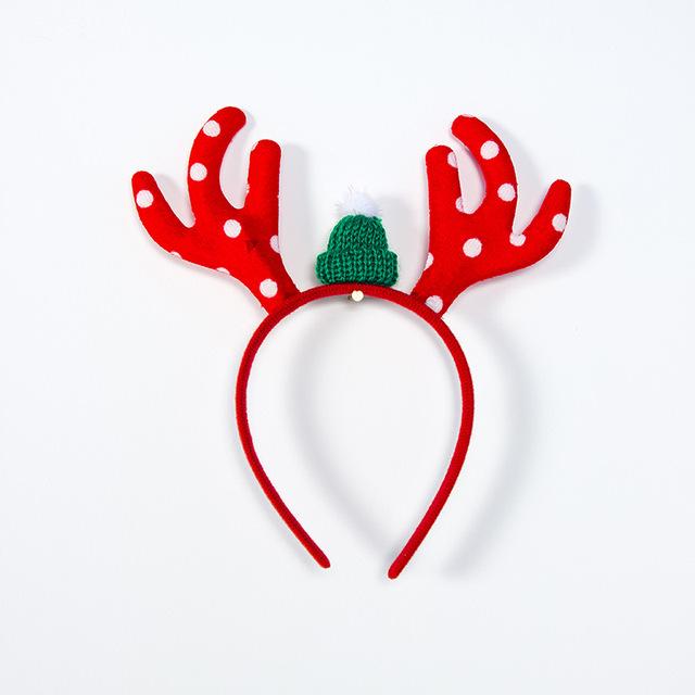 Merry Christmas headband featuring festive antlers and snowflake decorations, perfect for holiday celebrations.