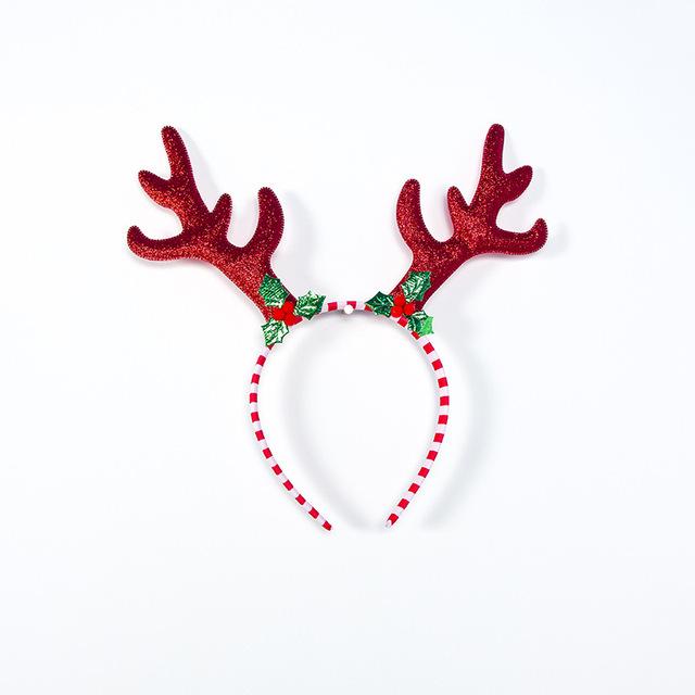 Merry Christmas headband featuring festive antlers and snowflake decorations, perfect for holiday celebrations.