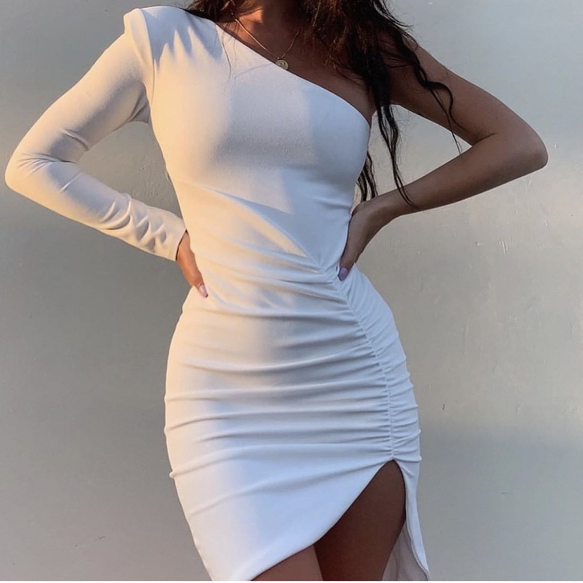 A stylish black and white off-shoulder club dress designed for women, featuring short sleeves and an A-line silhouette, perfect for night outings.