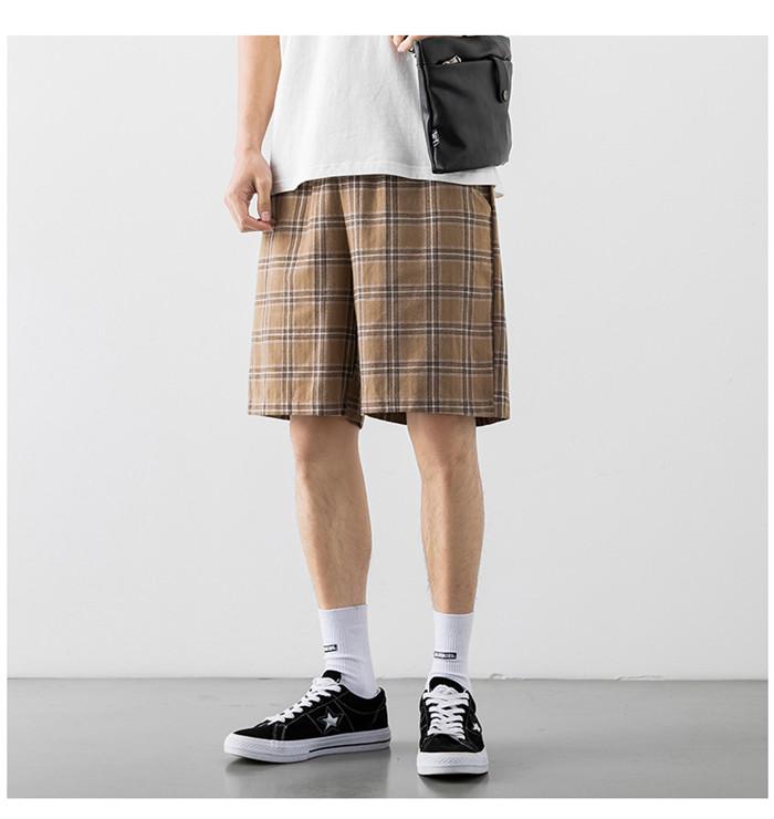 2020 Japanese Style Men's Grid Shorts in a casual setting, showcasing the lightweight polyester material and stylish design.