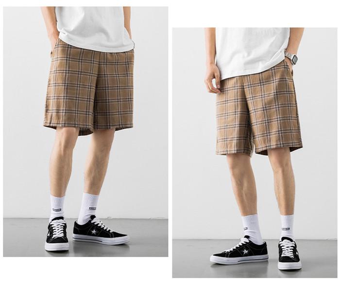 2020 Japanese Style Men's Grid Shorts in a casual setting, showcasing the lightweight polyester material and stylish design.