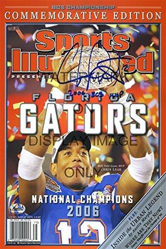 2006 Florida Gators Sports Illustrated print, featuring vibrant colors and a printed signature, framed in black.