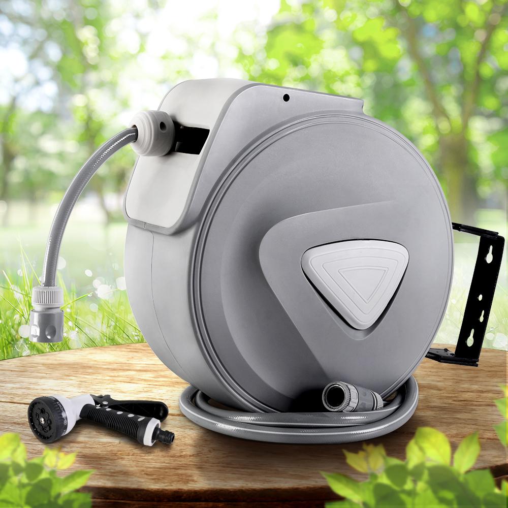 20M Retractable Water Hose Reel with a grey finish, wall-mounted design, and a 9-setting spray gun for versatile watering.