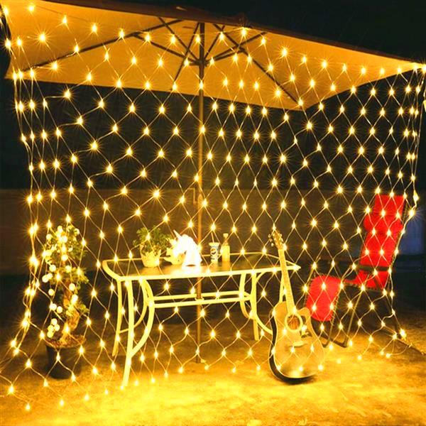 210 LED Fairy Net Light Mesh Curtain String with warm white lights, perfect for weddings and festive decorations, showcasing a beautiful illuminated backdrop.