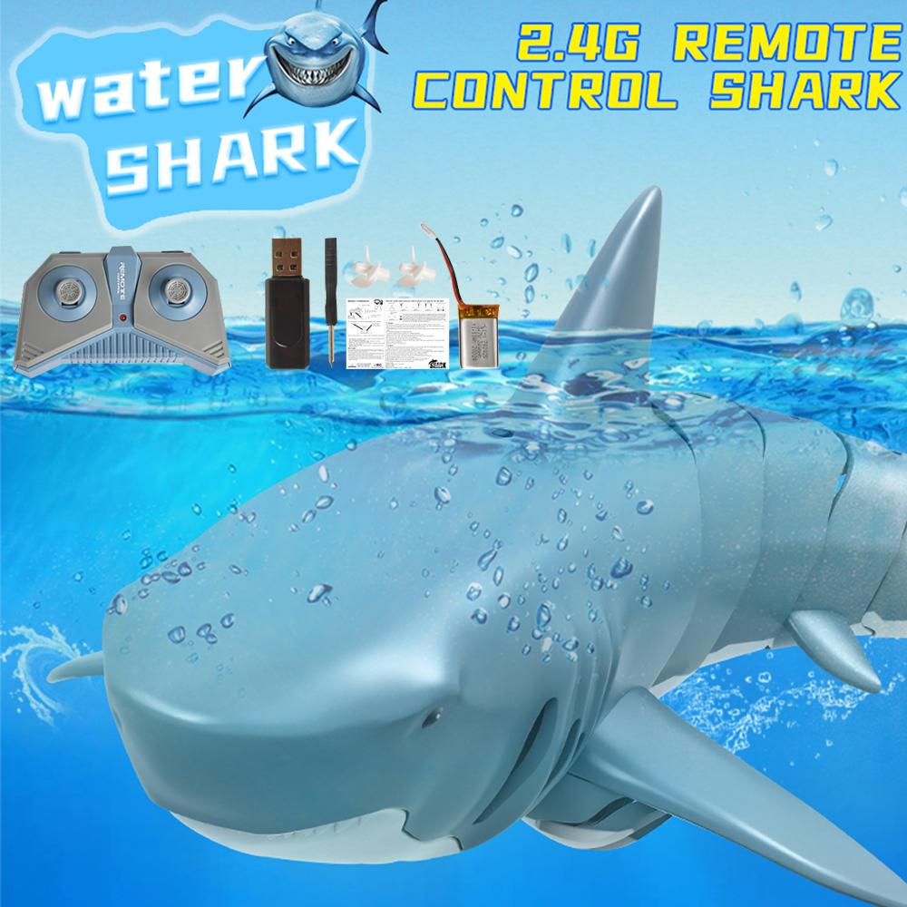 A blue 2.4G remote control shark toy, designed for kids, showcasing its realistic swimming motion and 360-degree rotation feature.