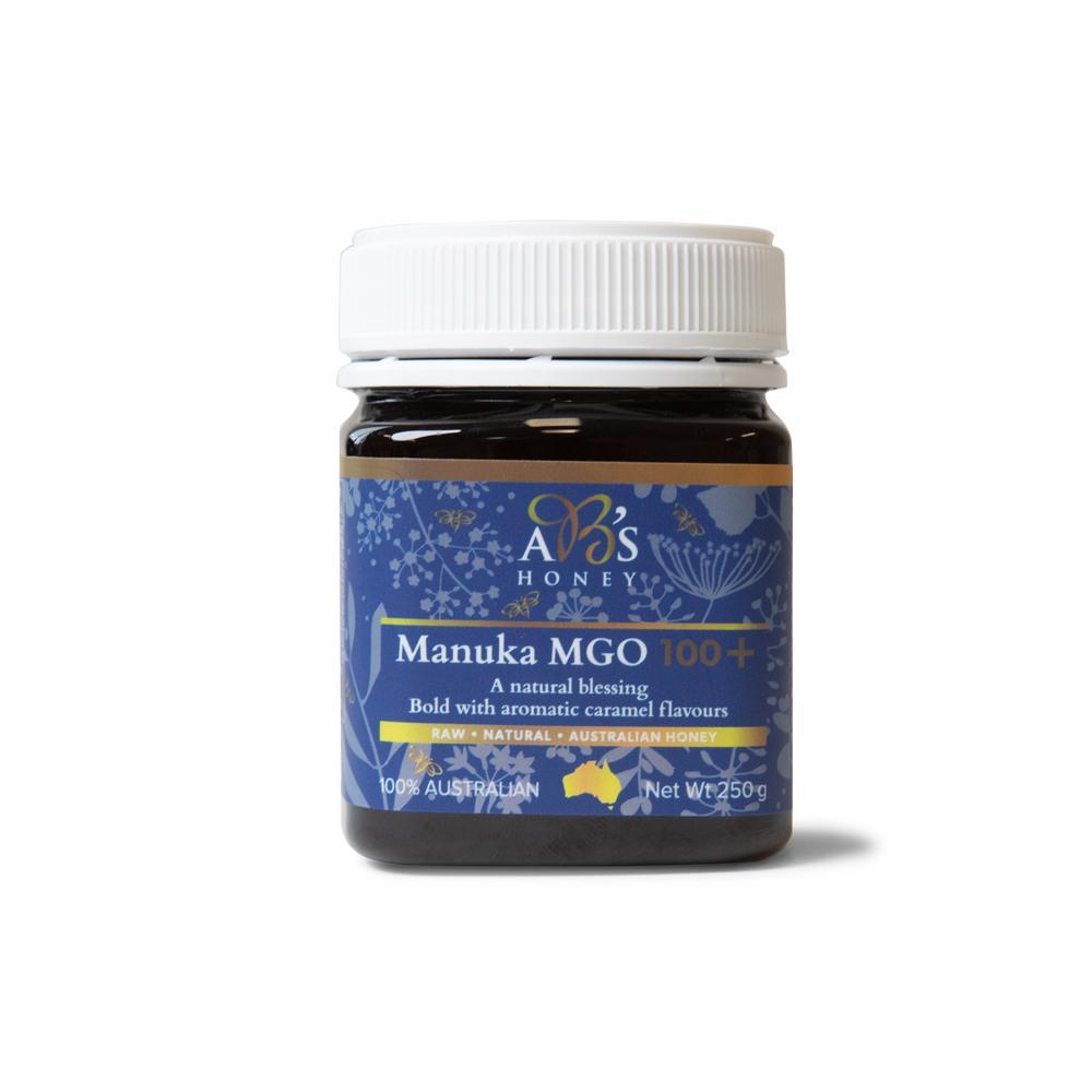 250g jar of MGO 100+ Australian Manuka Honey with a rich dark color, showcasing its pure and natural quality.