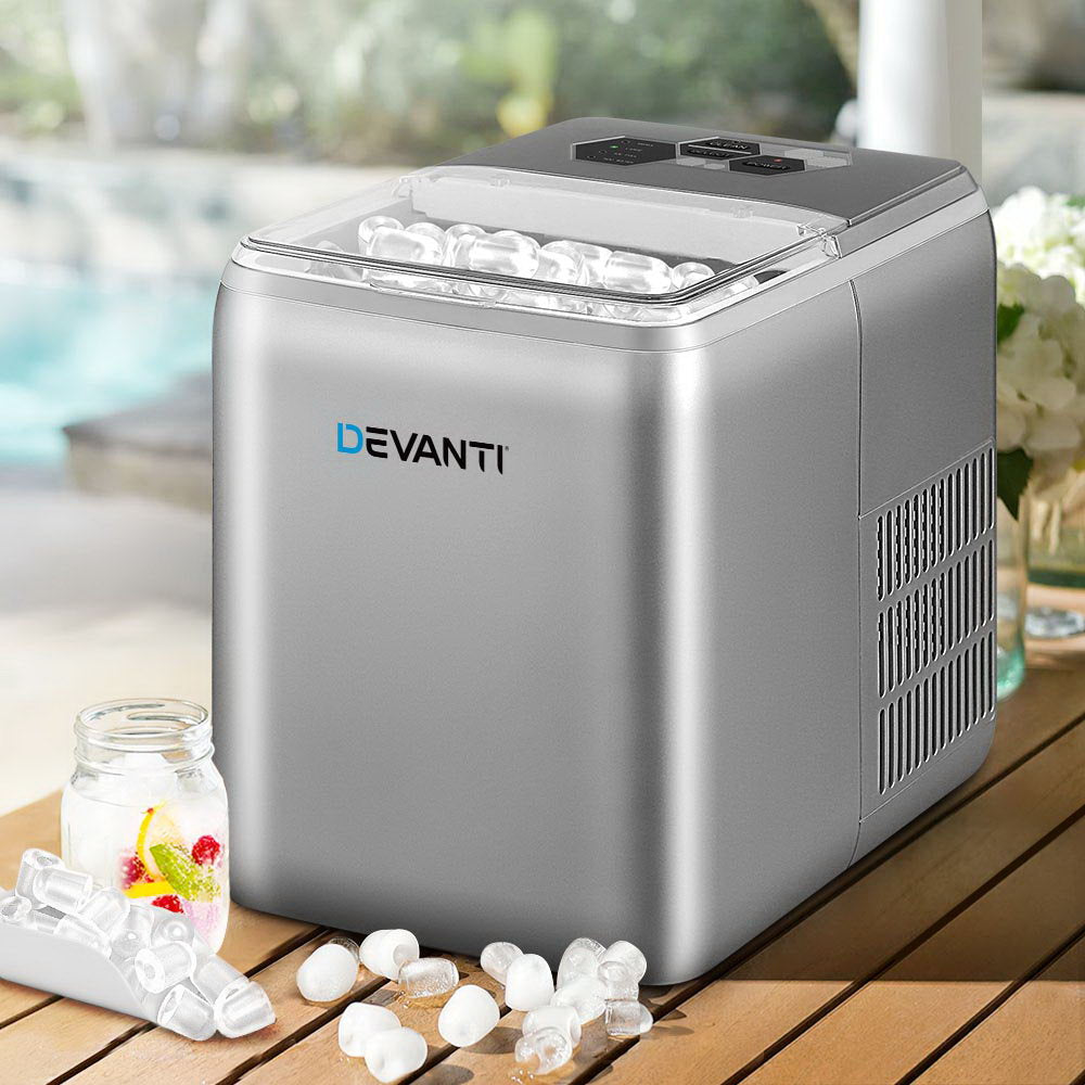 2.6L Portable Ice Maker Machine with control panel and transparent window, producing bullet-shaped ice cubes.