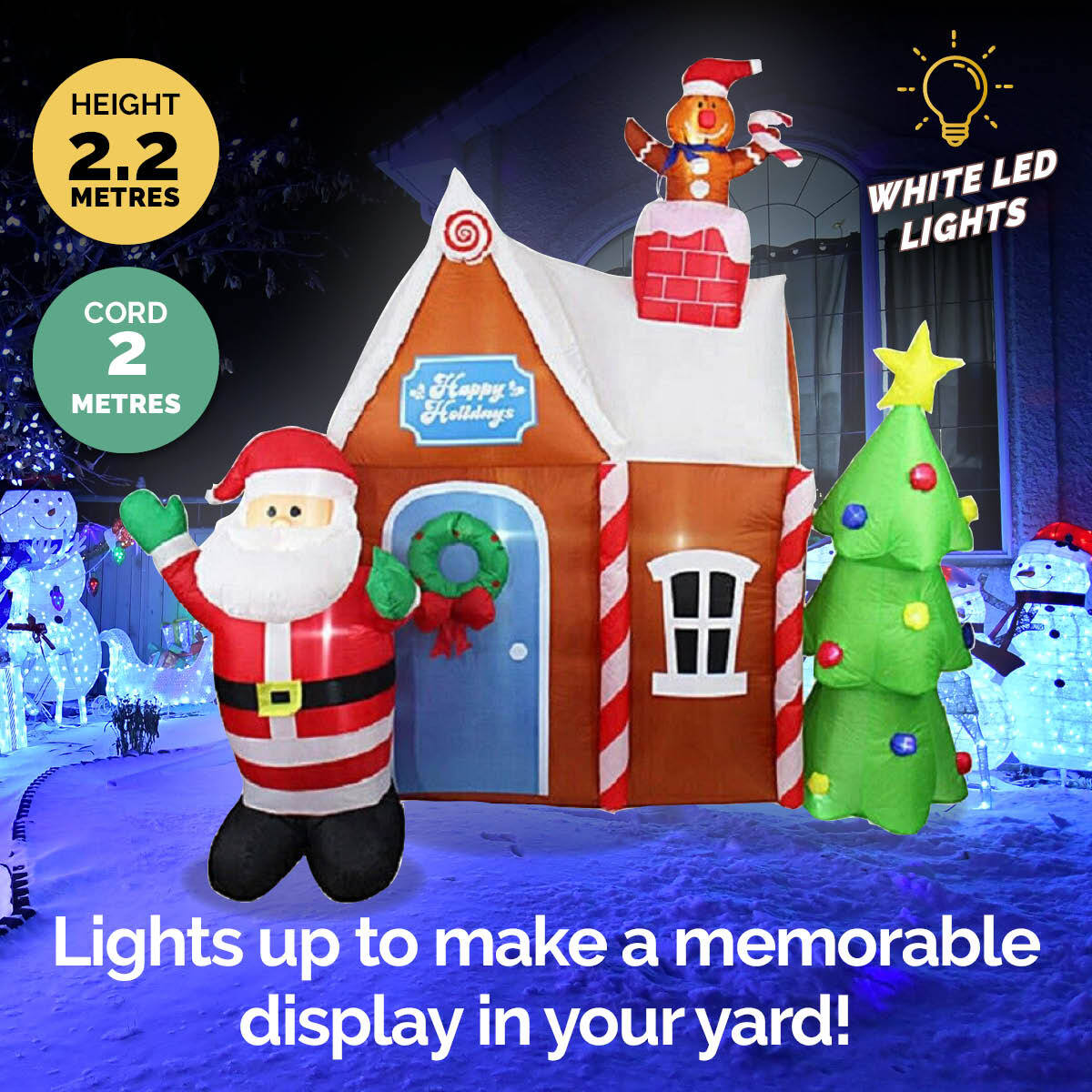 A large inflatable gingerbread house with Santa, Christmas tree, and gingerbread man, illuminated by bright white LED lights, perfect for outdoor Christmas decorations.