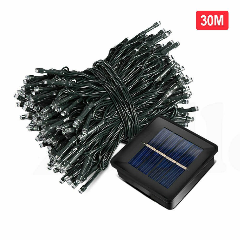 30M 300LED solar powered fairy lights with warm white glow, perfect for outdoor decoration in gardens and patios.