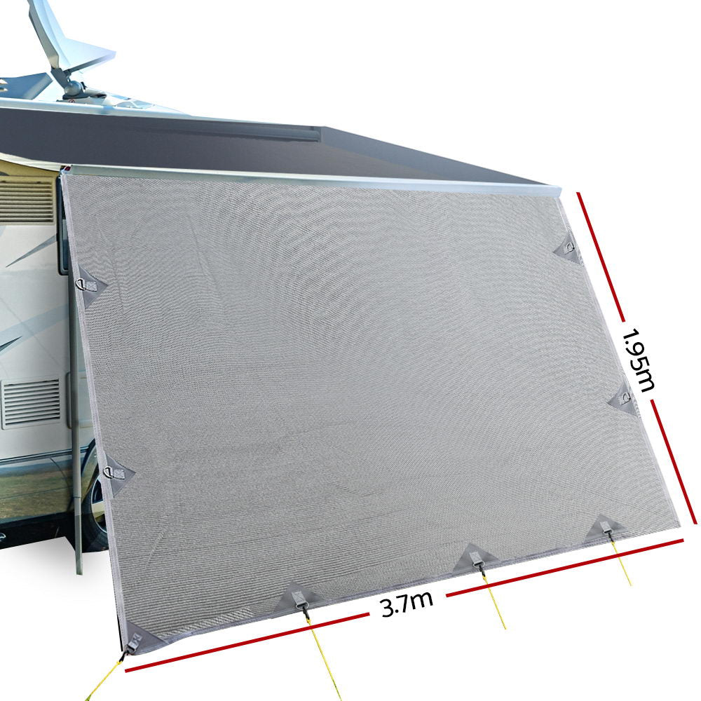 3.7M Caravan Privacy Screen attached to a caravan awning, providing shade and privacy in a camping setting.