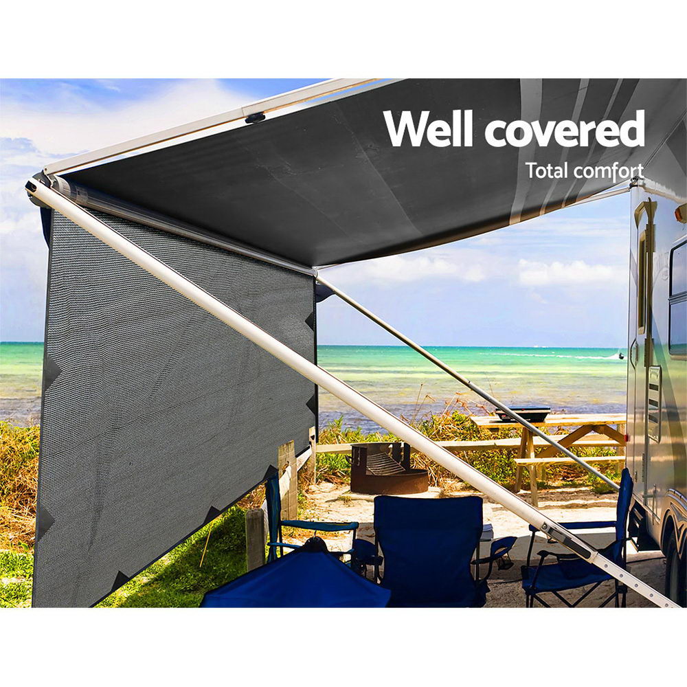 3.7M Caravan Privacy Screen attached to a caravan awning, providing shade and privacy in a camping setting.