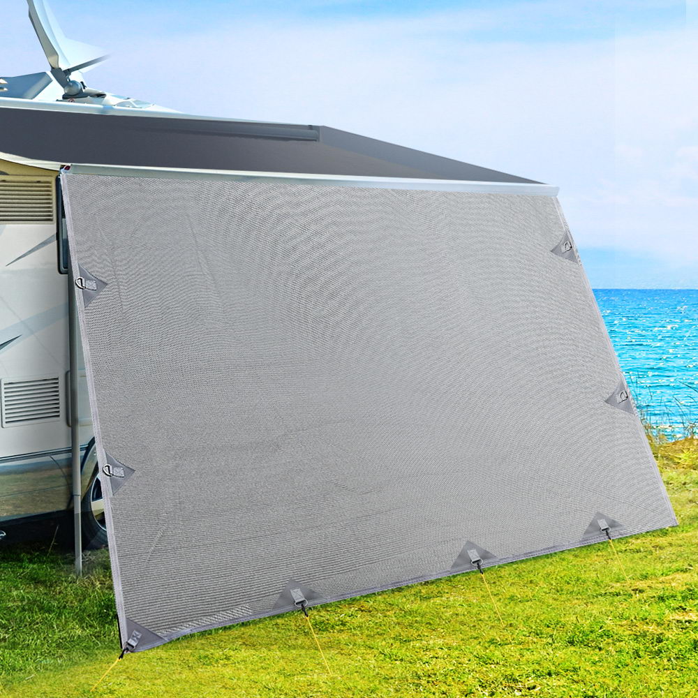 3.7M Caravan Privacy Screen attached to a caravan awning, providing shade and privacy in a camping setting.