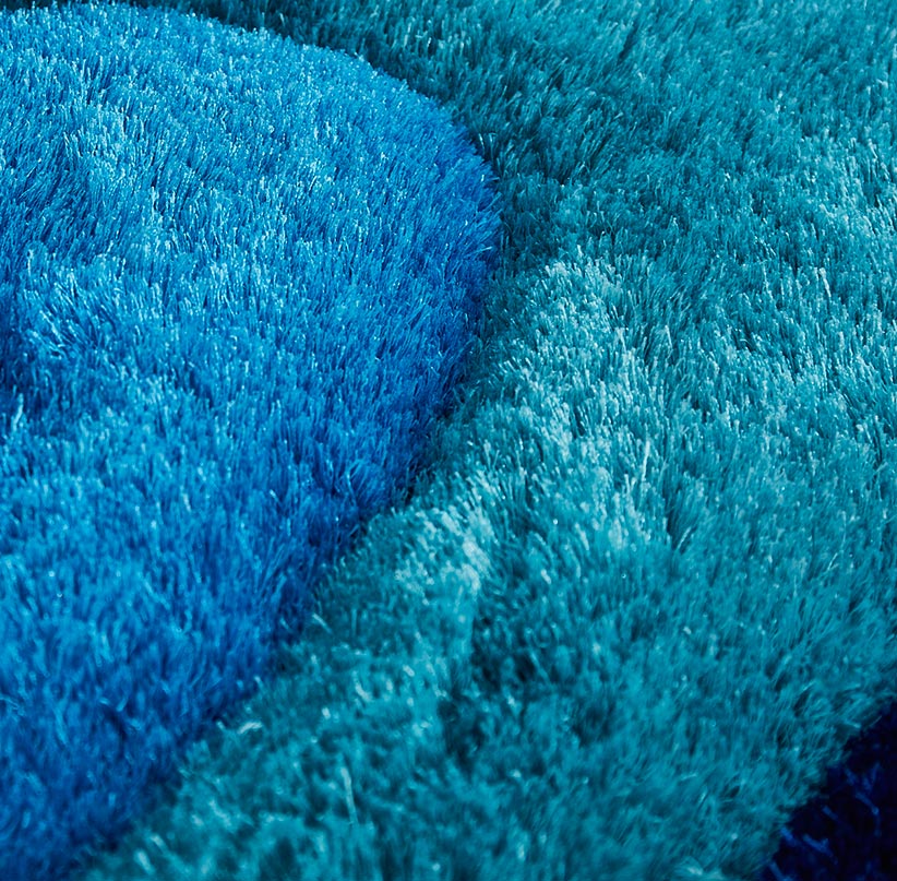 3D Ocean Waves Blue Shag Area Rug featuring vibrant blue colors and plush texture, ideal for beach homes and kids' rooms.