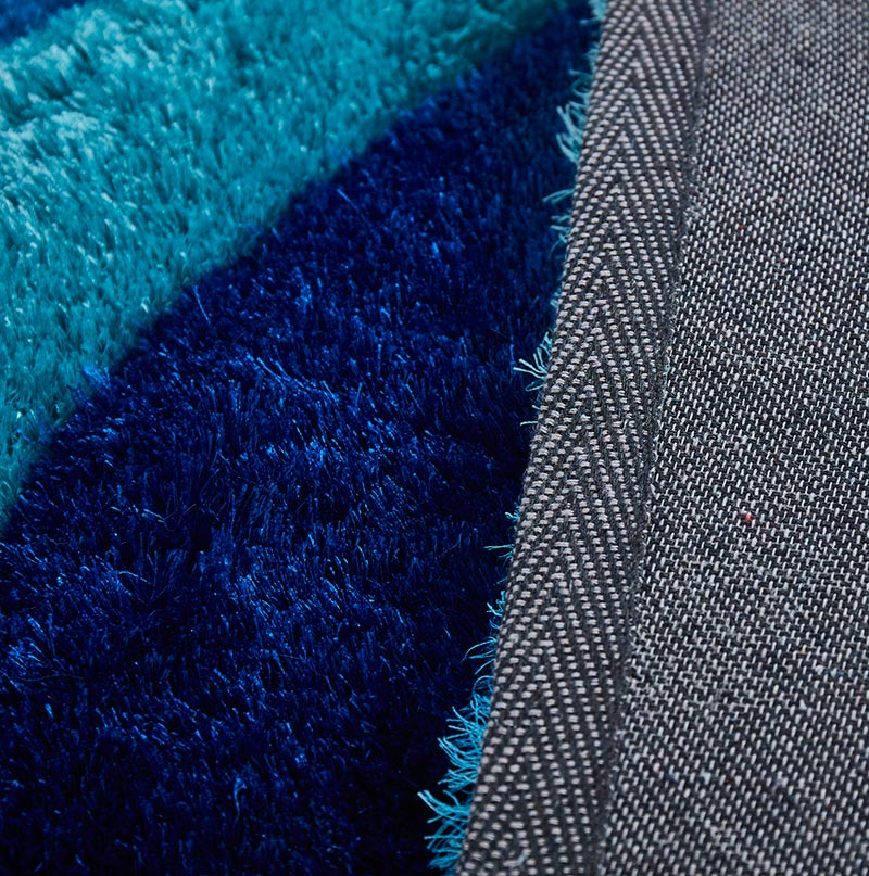 3D Ocean Waves Blue Shag Area Rug featuring vibrant blue colors and plush texture, ideal for beach homes and kids' rooms.