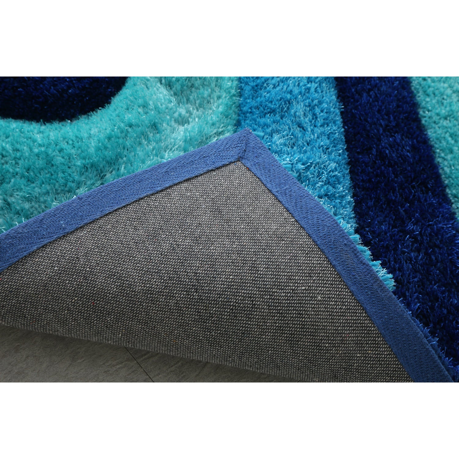 3D Ocean Waves Blue Shag Area Rug featuring vibrant blue colors and plush texture, ideal for beach homes and kids' rooms.