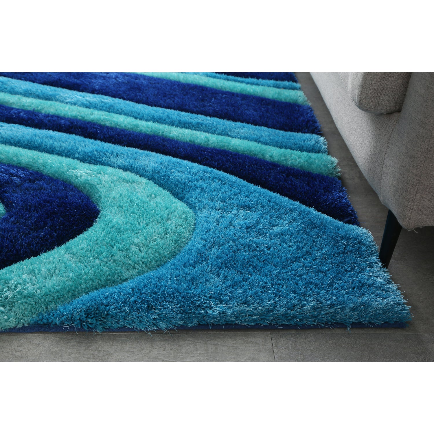 3D Ocean Waves Blue Shag Area Rug featuring vibrant blue colors and plush texture, ideal for beach homes and kids' rooms.