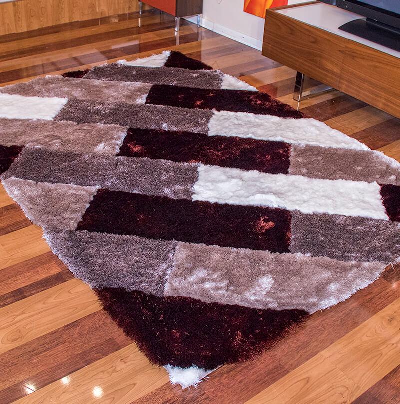 3D Parquette Shaggy Area Rug in beige and brown, showcasing its soft texture and stylish design.