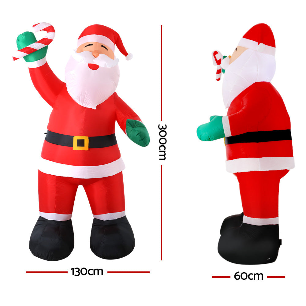 A 3-meter tall inflatable Santa Claus with a cheerful smile, illuminated by LED lights, standing in a festive outdoor setting.