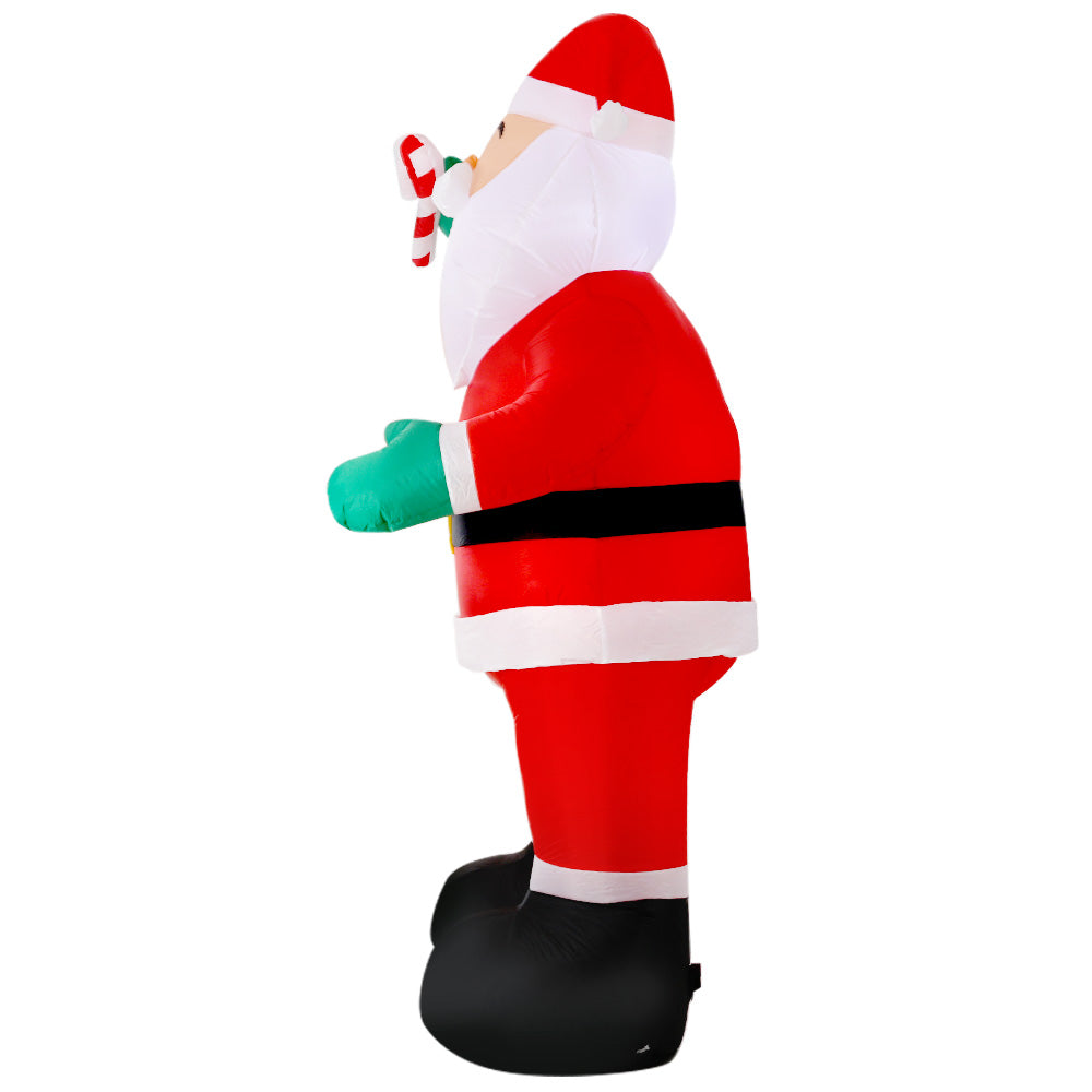 A 3-meter tall inflatable Santa Claus with a cheerful smile, illuminated by LED lights, standing in a festive outdoor setting.