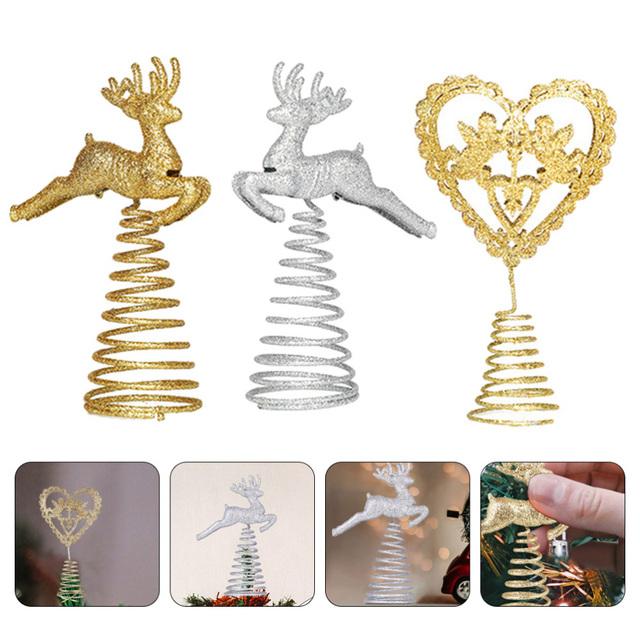 Three creative Christmas treetop ornaments in golden and silver designs, featuring a heart shape and elk styles, perfect for festive decoration.