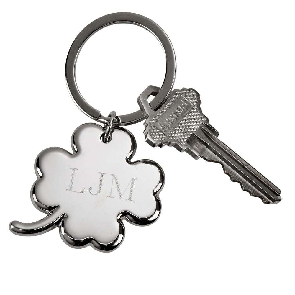 A nickelplated 4-leaf clover keychain, 3 inches long, featuring a polished clover charm and a sturdy keyring, presented in a black gift box.