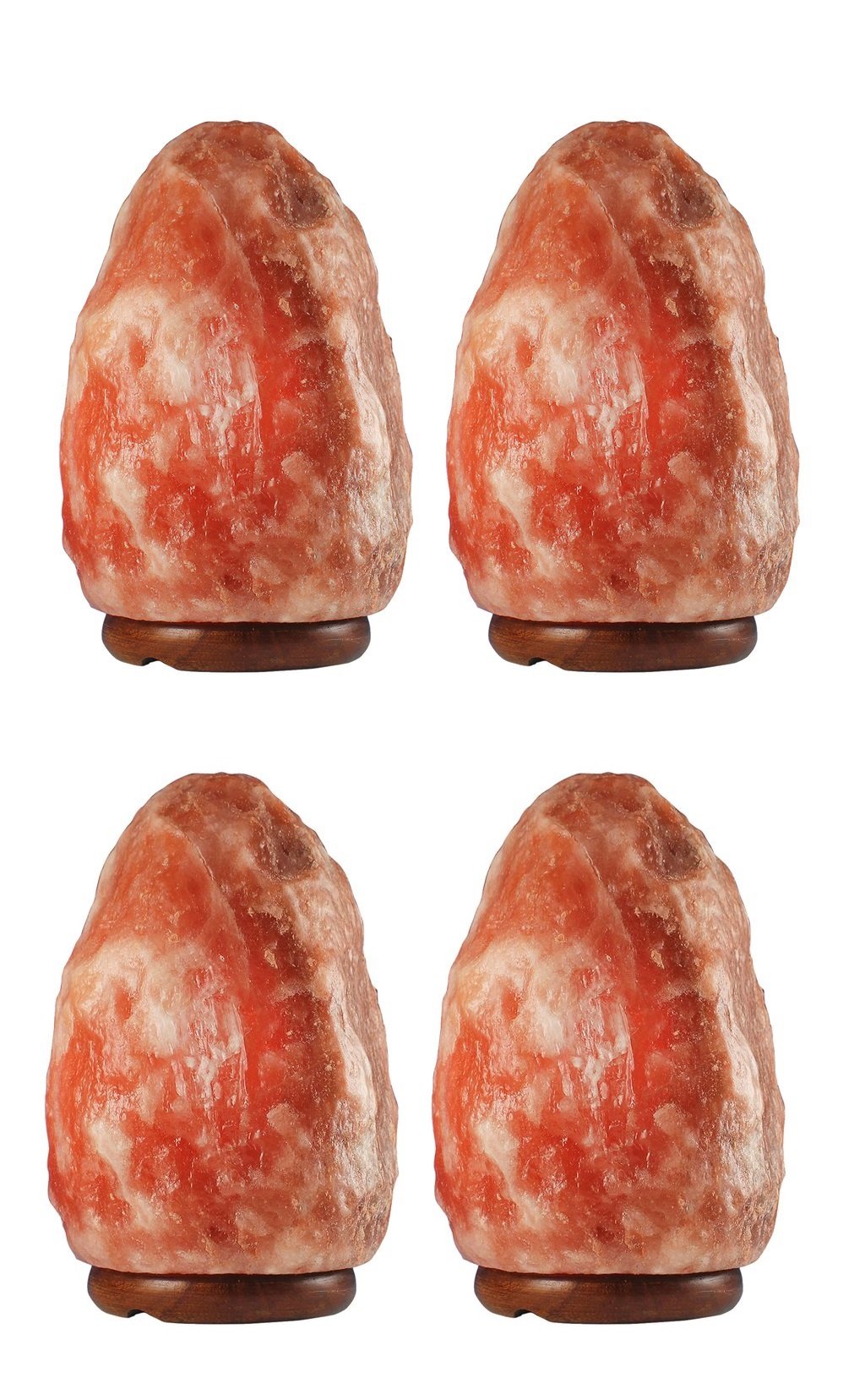 Four unique Natural Himalayan Salt Lamps, hand-carved with varying shapes and colors, resting on polished wooden bases, emitting a warm amber glow.