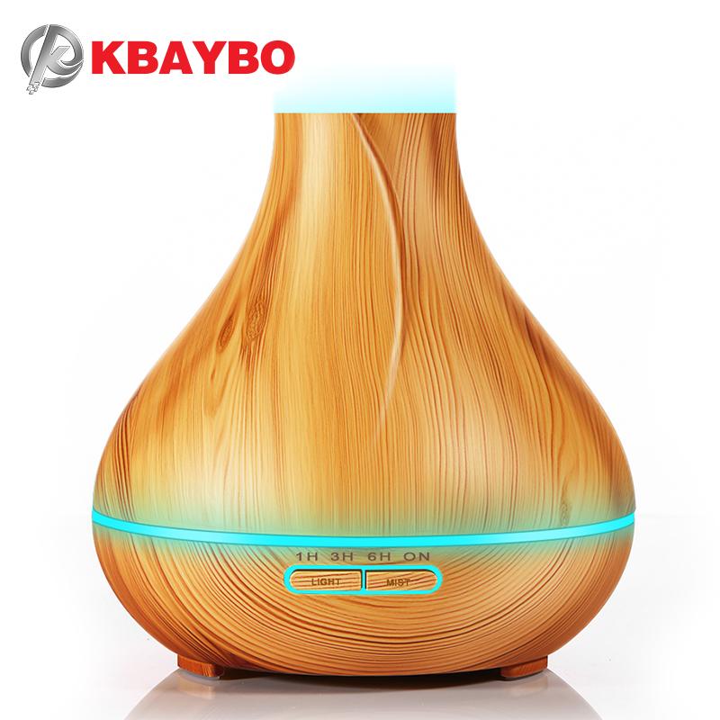 400ml flat top light wood grain humidifier with essential oil diffuser, showcasing a sleek design and mist output.