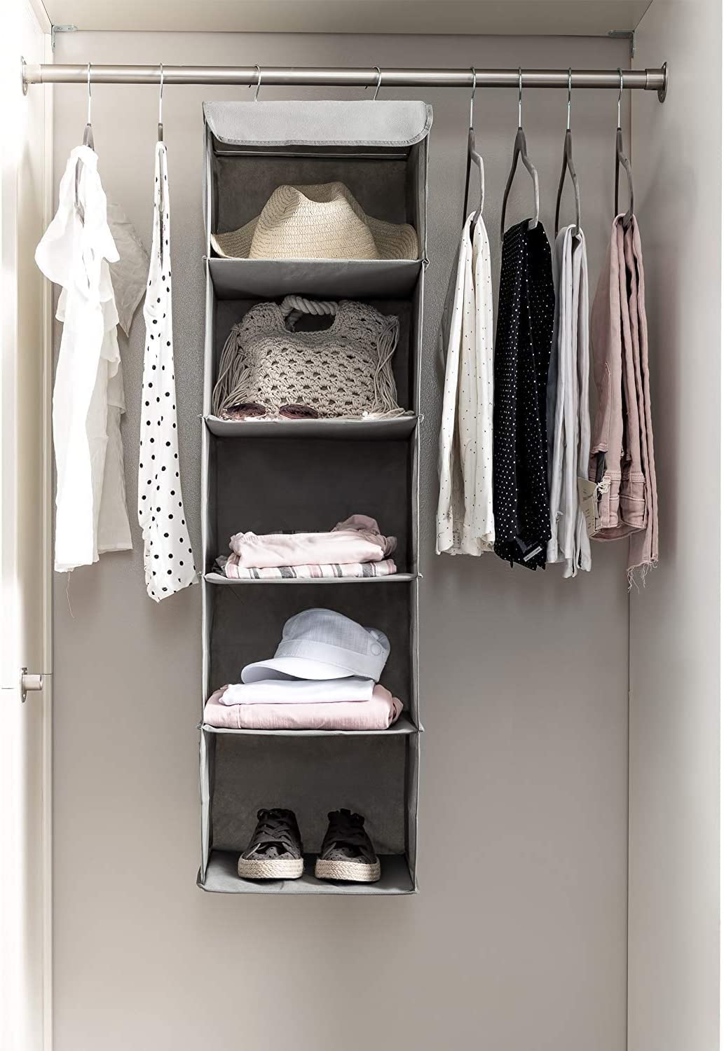 5 Foldable Shelf Hanging Closet Organizer with side pockets, showcasing its durable design and spacious shelves for efficient storage.