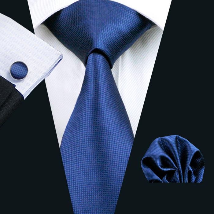 A stylish set of 50 solid color silk men's ties with matching handkerchief and cufflinks, showcasing various colors and elegant design.