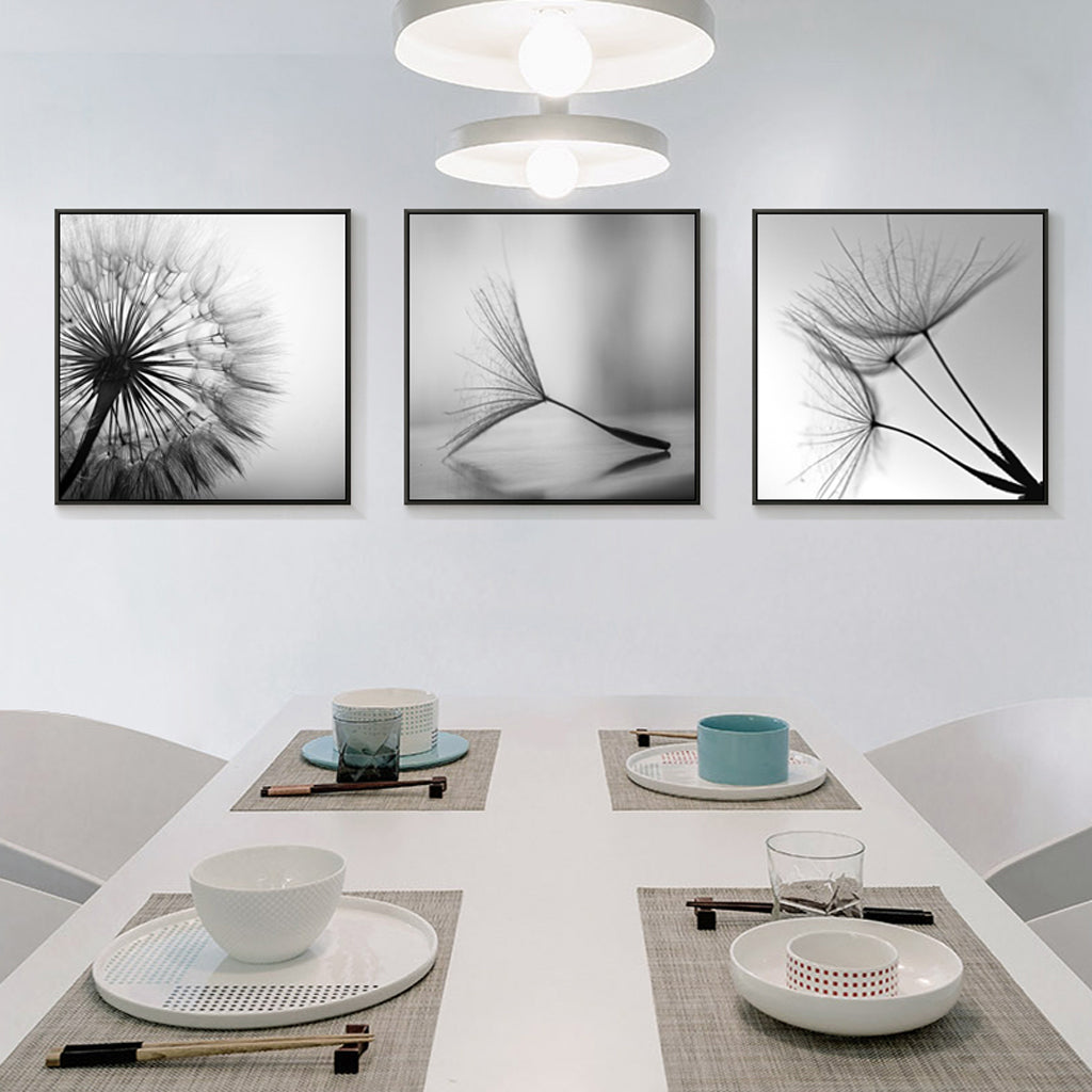 Three sets of 50cmx50cm botanical dandelion canvas wall art framed in black, showcasing vibrant colors and intricate details.