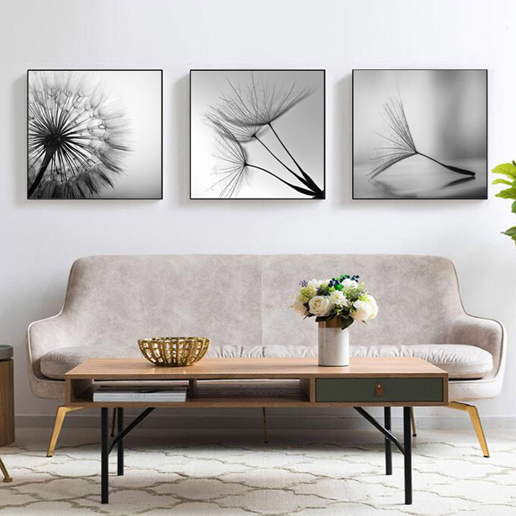 Three sets of 50cmx50cm botanical dandelion canvas wall art framed in black, showcasing vibrant colors and intricate details.