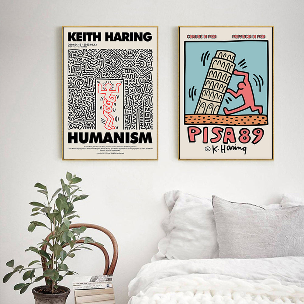 50cmx50cm wall art by Keith Haring in a gold frame, showcasing vibrant colors and a unique floating effect.