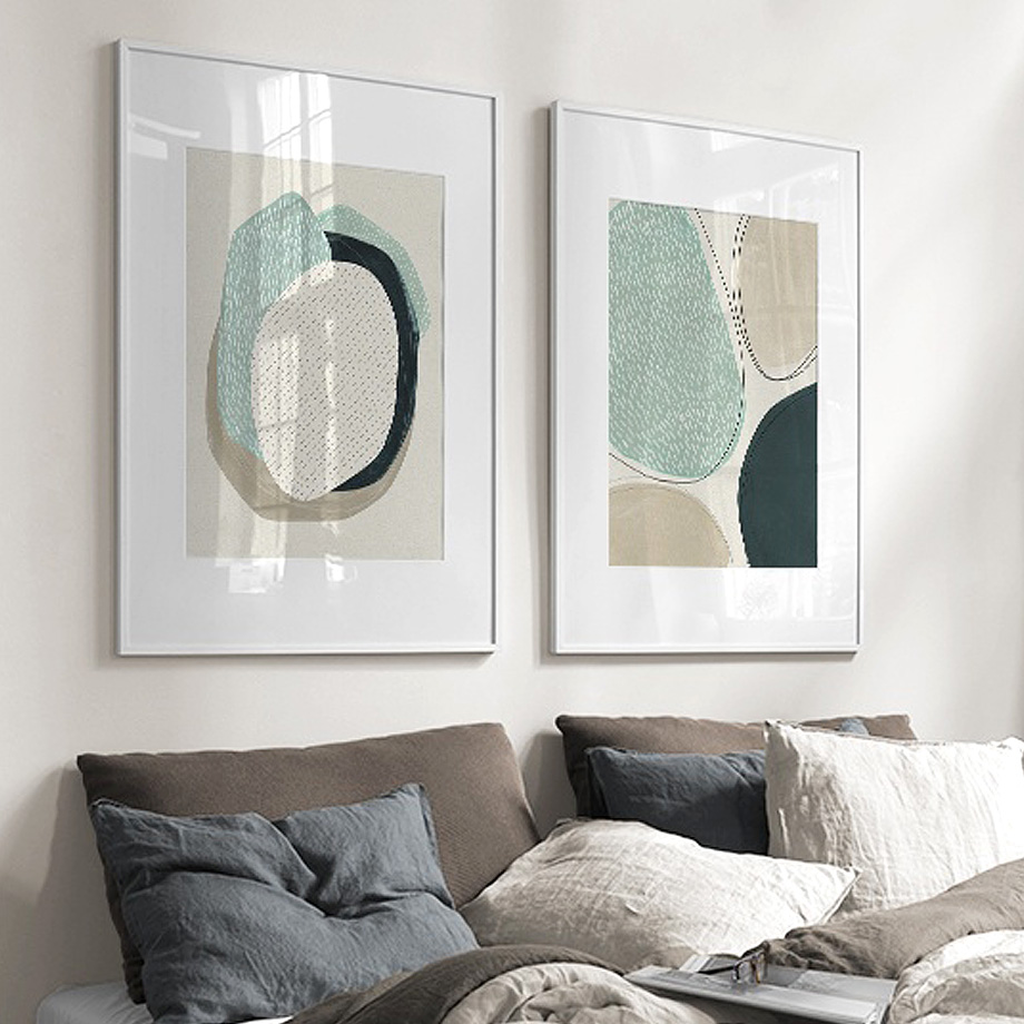 Two sets of 50cmx70cm abstract green circle canvas wall art in white frames, showcasing modern design and vibrant colors.