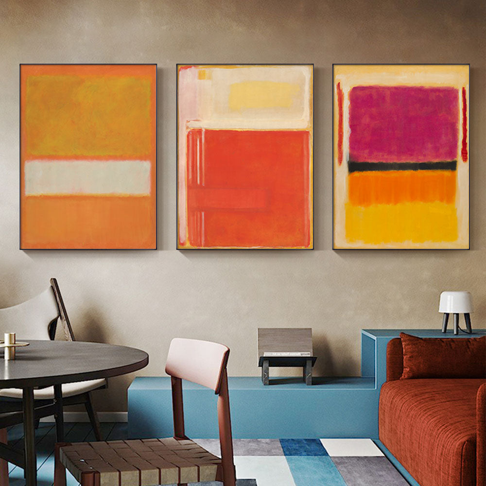 A set of three colorful canvas prints by Mark Rothko, framed in black, showcasing abstract art with vibrant colors.