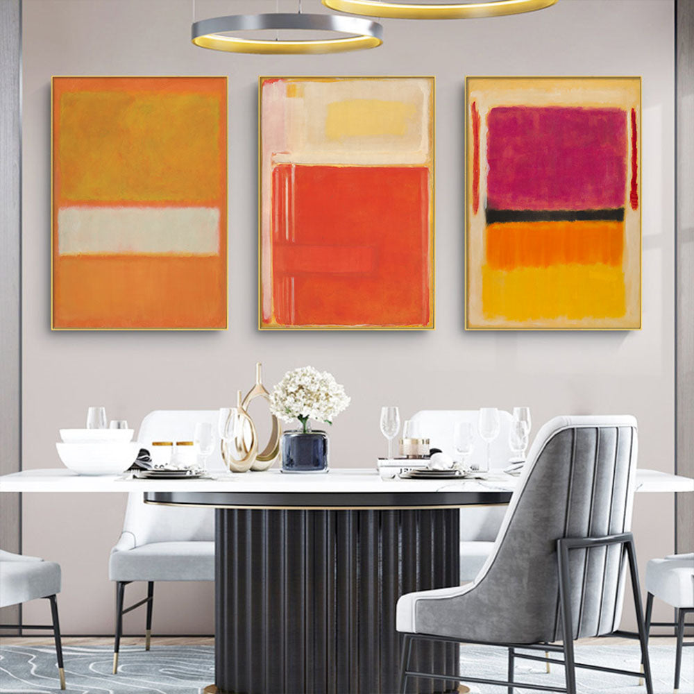 A set of three colorful canvas prints by Mark Rothko, framed in black, showcasing abstract art with vibrant colors.