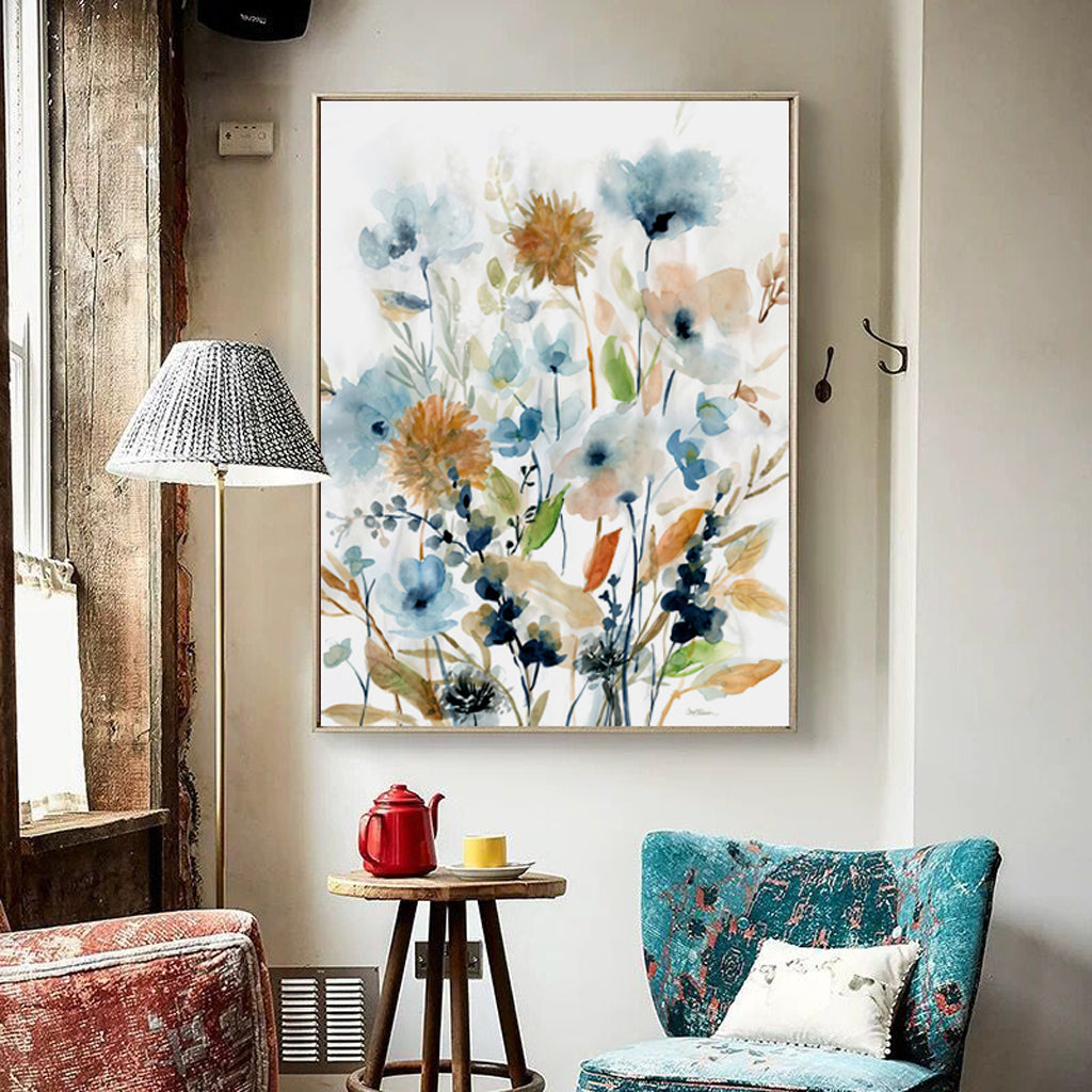 A vibrant 50cmx70cm watercolour canvas print featuring colourful florals, elegantly framed in a gold floating frame.