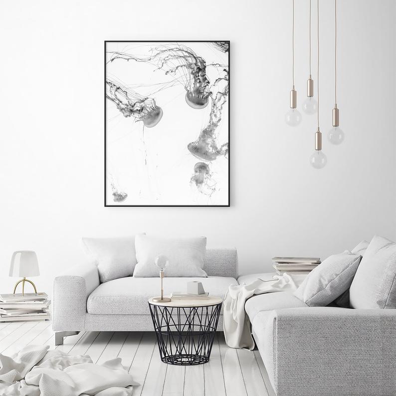 50cmx70cm Jellyfish Canvas Wall Art in a black frame, showcasing vibrant colors and a floating effect.