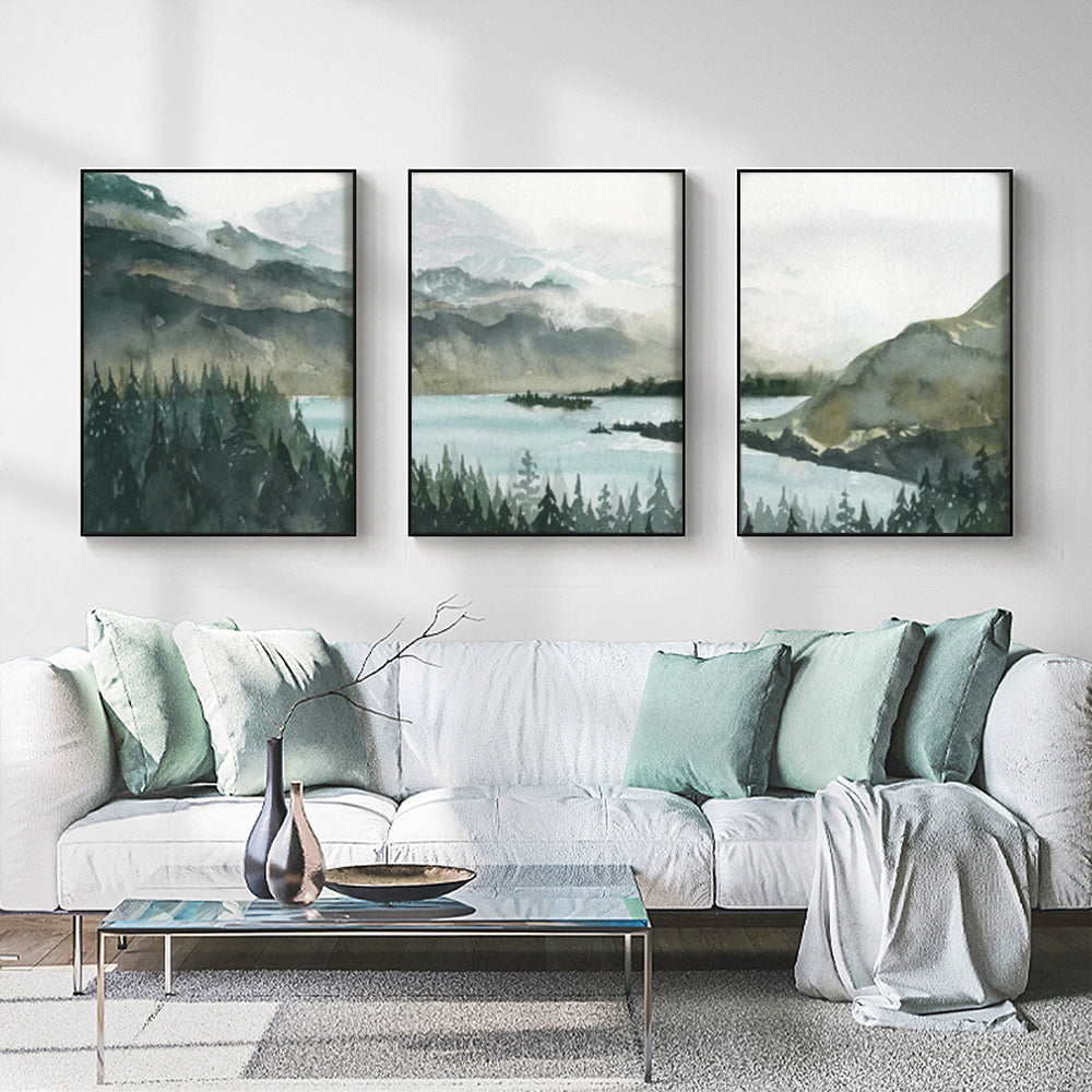 A set of three 50cmx70cm landscape canvas wall art pieces framed in black, showcasing vibrant colors and a floating effect.