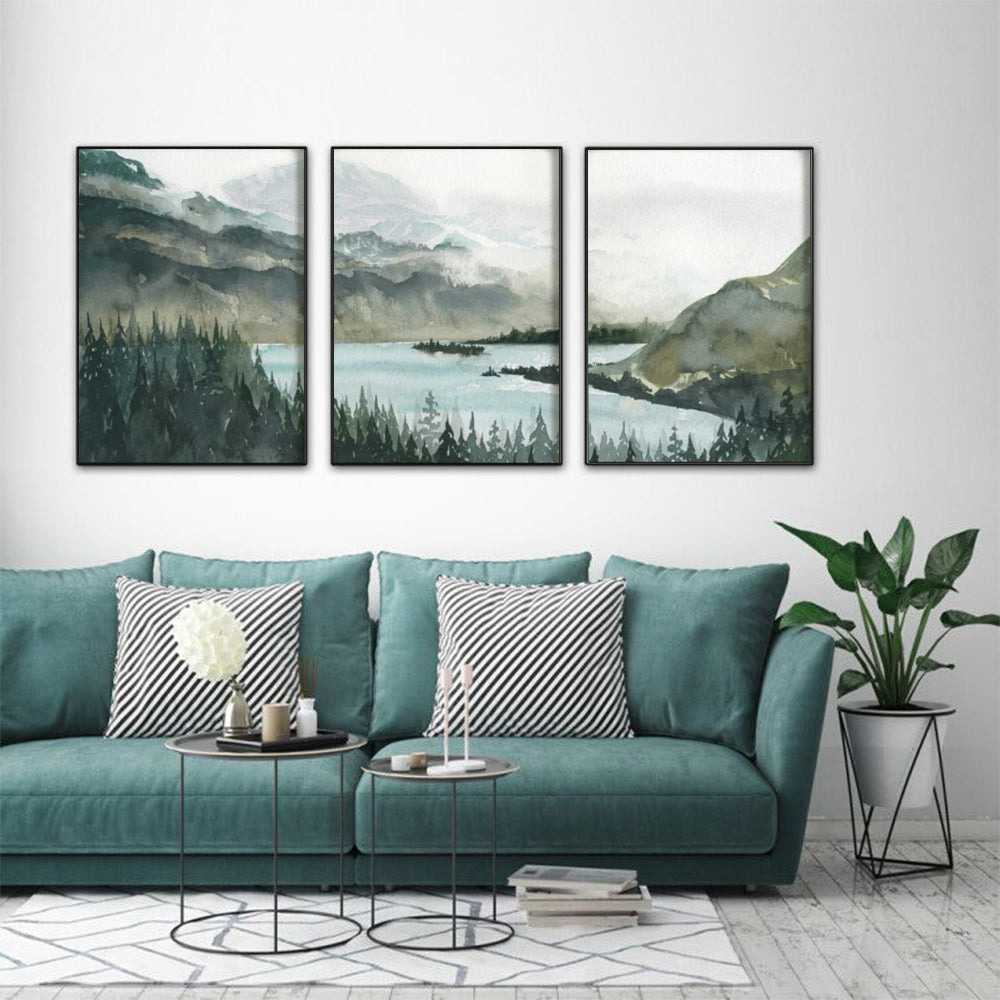 A set of three 50cmx70cm landscape canvas wall art pieces framed in black, showcasing vibrant colors and a floating effect.