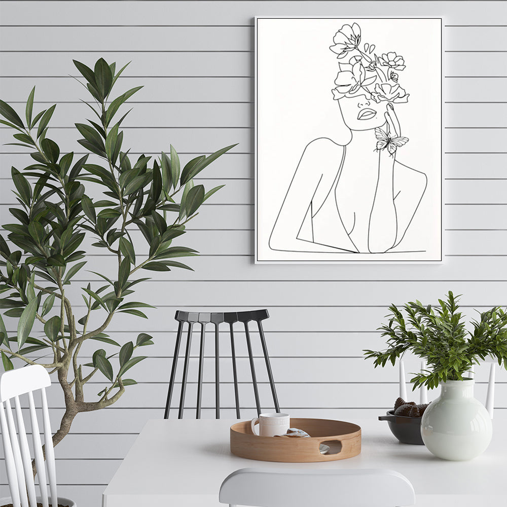 50cmx70cm Line Art Girl Canvas Wall Art framed in white, showcasing a modern design perfect for home decor.