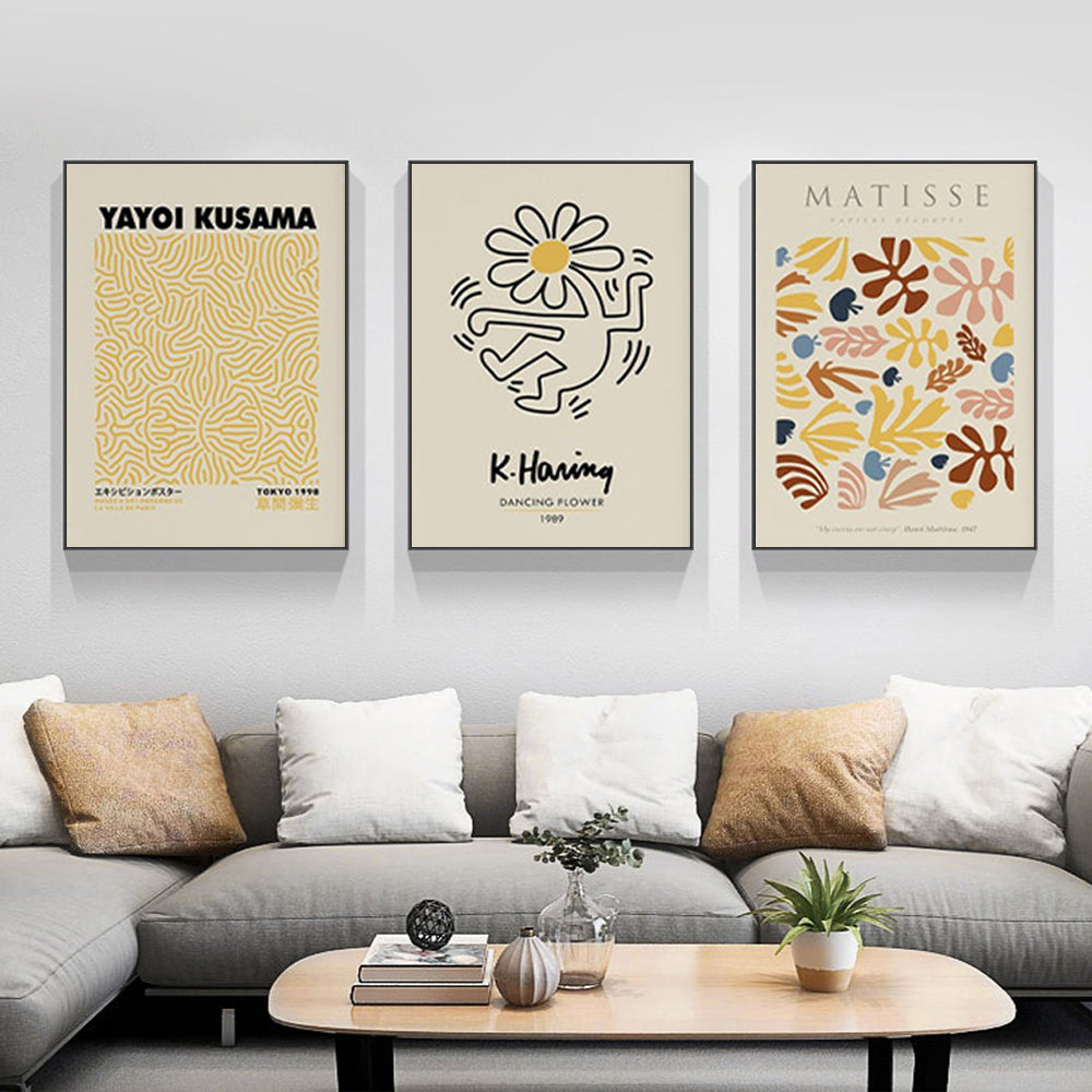 A set of three framed canvas prints featuring Matisse, Keith Haring, and Yayoi Kusama art, elegantly displayed in black frames.