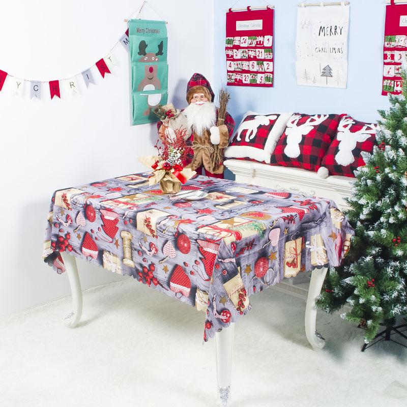 A festive Christmas tablecloth featuring vibrant holiday designs, perfect for enhancing your holiday dining experience.