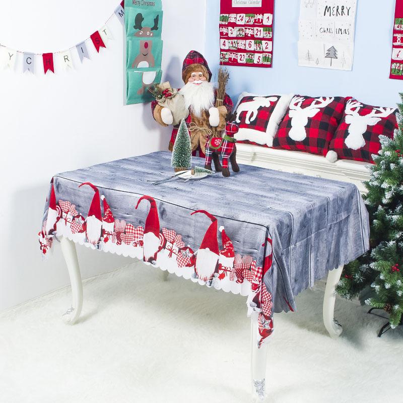 A festive Christmas tablecloth featuring vibrant holiday designs, perfect for enhancing your holiday dining experience.