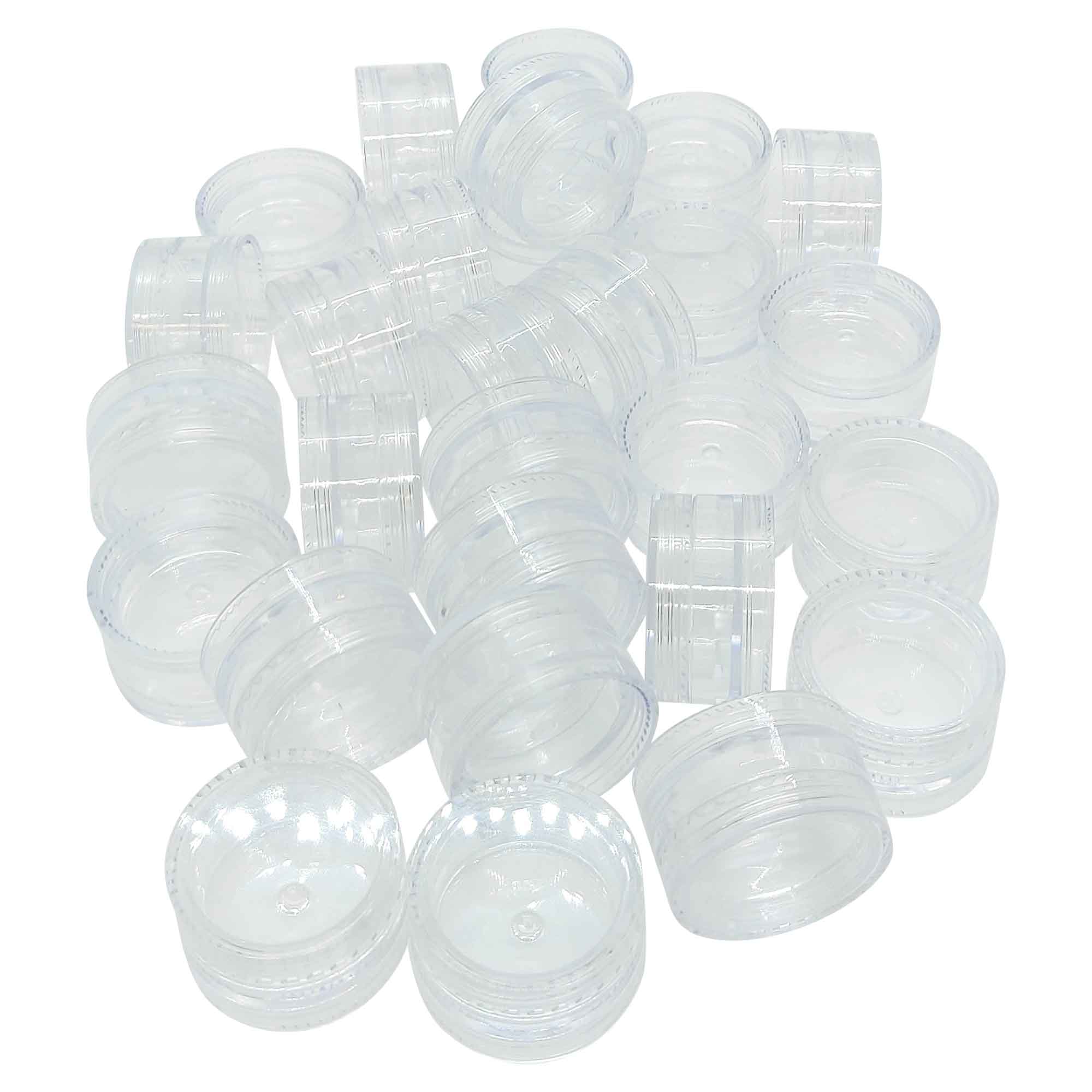 A set of 50 clear 3ml lip balm containers with lids, ideal for storing cosmetics and creams.